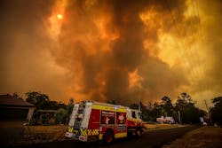 Firefighters battles a bushfire near Bargo, Sydney, Australia on Dec. 21.
