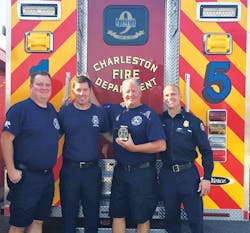 The author (right) is thankful for (from left) Capt. Anthony Morely for teaching him how to drive a ladder truck; Engineer Les Baker for teaching him how to train to live; and Capt. Lance Williams for teaching him how to be an engineer and a company officer.