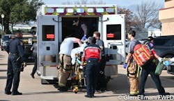 Fire and EMS crews tend to a victim at the chruch shooting.