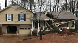 A fallen tree damaged a house in Madison, AL, as severe weather moved through the South and the Midwest over the weekend.