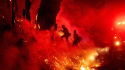 Firefighters work to control flames from a backfire during the Maria fire Nov. 1 in Santa Paula, CA. Firefighters work to control flames from a backfire during the Maria fire Nov. 1 in Santa Paula, CA.