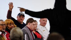 A volunteer firefighter asks a question during a town hall meeting at Buena Vista Community Center to discuss a possible police-fire merger on Jan. 3, 2020. A volunteer firefighter asks a question during a town hall meeting at Buena Vista Community Center to discuss a possible police-fire merger on Jan. 3, 2020.