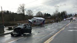 A Vancouver, WA, man was killed after he collided with an AMR ambulance in Clark County on Tuesday, injuring two paramedics.