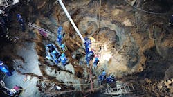 Indianapolis Fire Department's collapse rescue team worked for more than 10 hours to recover the body of a 56-year-old man who fell into a 15-foot-deep trench when the ground gave way while digging a well Monday. Indianapolis Fire Department's collapse rescue team worked for more than 10 hours to recover the body of a 56-year-old man who fell into a 15-foot-deep trench when the ground gave way while digging a well Monday.