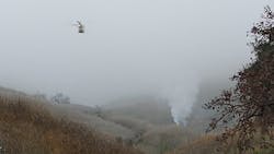 A helicopter crashed and burst into flames, igniting a brush fire, in the hills above Calabasas, CA, on Sunday. A helicopter crashed and burst into flames, igniting a brush fire, in the hills above Calabasas, CA, on Sunday.