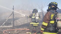 Firefighters from Doña Ana County's South Fire District work to put out a fire that destroyed a La Union, NM, mobile home Tuesday. Firefighters from Doña Ana County's South Fire District work to put out a fire that destroyed a La Union, NM, mobile home Tuesday.