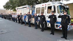 Firefighters and police officers from various agencies provided an escort for and saluted the bodies of Lubbock, TX, Fire Lt. Eric Hill and police officer Nicholas Reyna in Fort Worth.