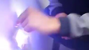 Sparks fly in a screen shot of from a viral video challenge involving a penny, a phone charger and an electrical outlet.