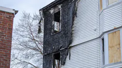 Firefighters rescued a woman from the third story of a multi-family house in Rockland, MA, after a five-alarm blaze broke out early Thursday.