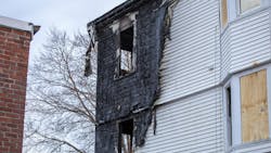 Firefighters rescued a woman from the third story of a multi-family house in Rockland, MA, after a five-alarm blaze broke out early Thursday. Firefighters rescued a woman from the third story of a multi-family house in Rockland, MA, after a five-alarm blaze broke out early Thursday.