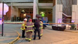Tuscaloosa, AL, firefighters help to extricate two construction who were trapped in a manlfit after beams fell on it Saturday. Tuscaloosa, AL, firefighters help to extricate two construction who were trapped in a manlfit after beams fell on it Saturday.