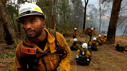Leonard Dimaculangan, of Pasadena, CA, and a Texas canyon hotshot captain, leads a group of American firefighters in Australia's Alpine National Park on Jan. 18, 2020.