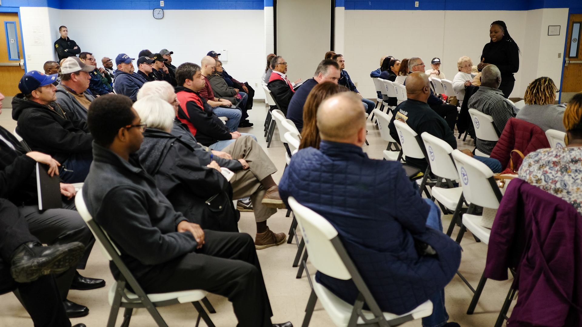 Dr. Chris Dillard, supervisor of the board of trustees in Buena Vista, MI, discusses a proposed merger of township police and fire departments with residents and stakeholders at a town hall meeting on Jan. 3, 2020.