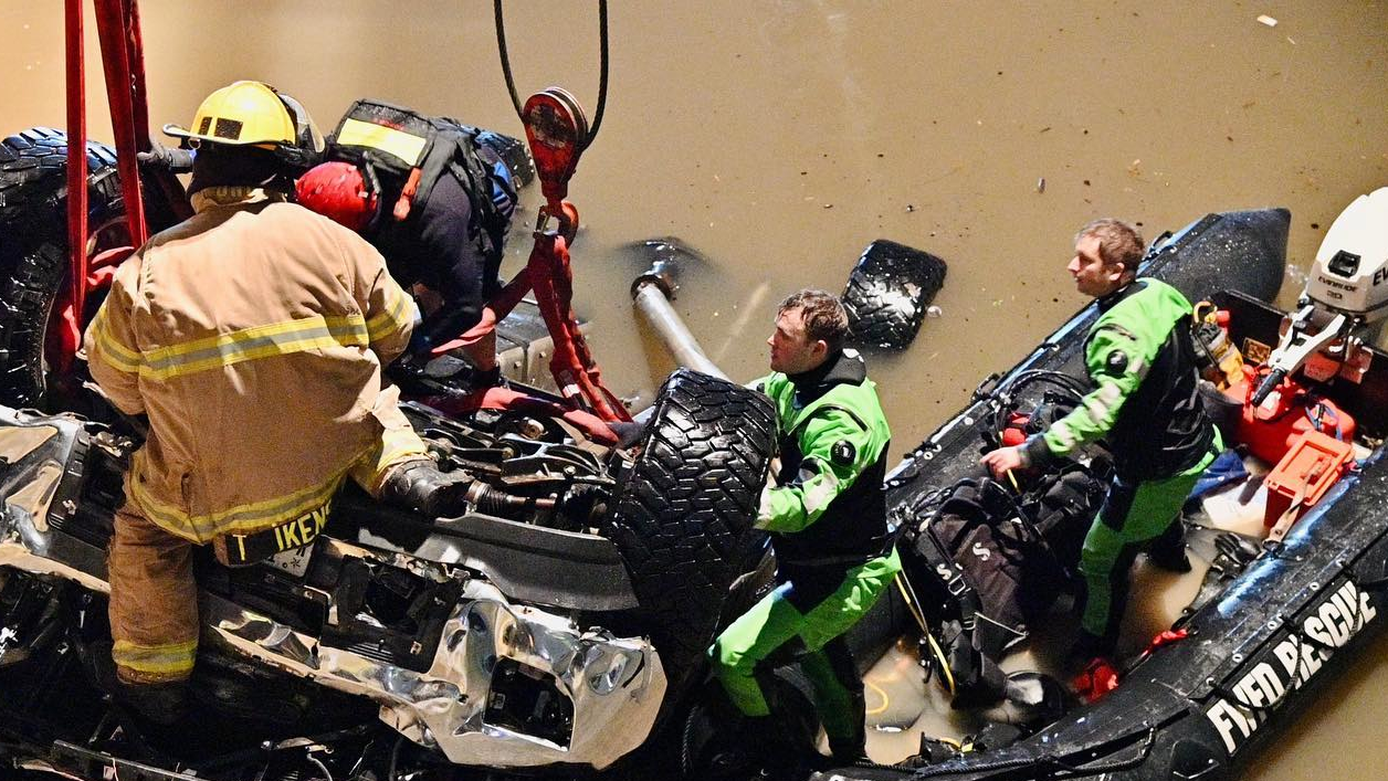 Fort Worth Fire Department crews work to remove a pickup truck from the Trinity River after a fatal accident on Friday, Jan. 17, 2020.