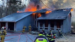 Firefighters battled a three-alarm fire after police and an ambulance were dispatched to medical alarm activation. Firefighters battled a three-alarm fire after police and an ambulance were dispatched to medical alarm activation.