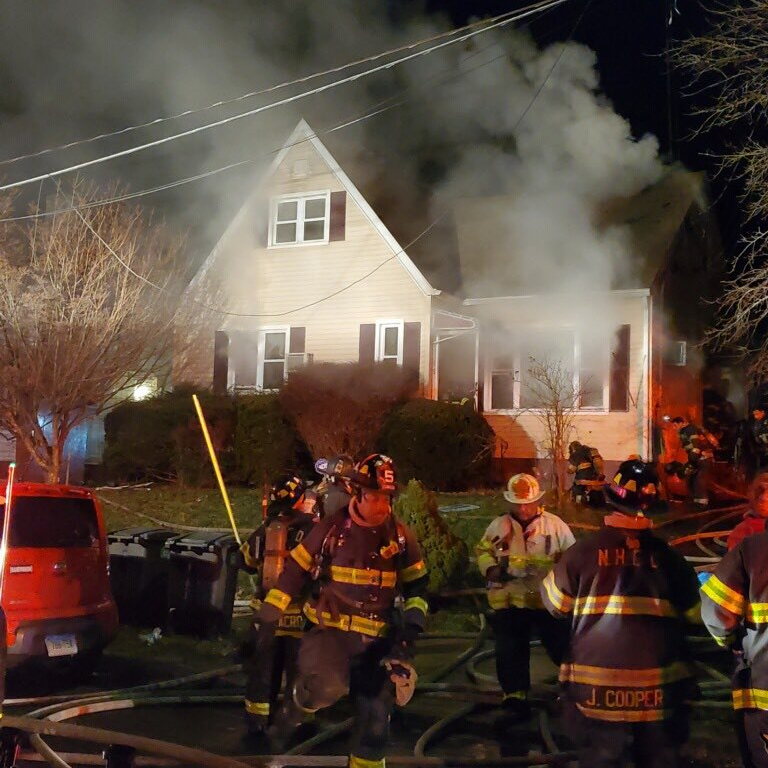 A New Haven, CT, firefighter and a resident were injured Sunday night during a three-alarm basement fire that displaced four people.