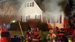 A New Haven, CT, firefighter and a resident were injured Sunday night during a three-alarm basement fire that displaced four people.