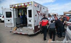 White Settlement and Fort Worth firefighters work with Medstar crews to move a shooting victim to the ambulance at the West Freeway Church of Christ on Dec. 29, 2019. White Settlement and Fort Worth firefighters work with Medstar crews to move a shooting victim to the ambulance at the West Freeway Church of Christ on Dec. 29, 2019.