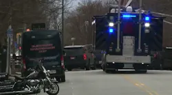 An armed Atlanta firefighter surrendered to police Tuesday after a standoff with SWAT units near police and fire headquarters.