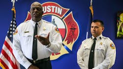 Austin, TX, Fire Chief Joel Baker (left) and Assistant Fire Chief Aaron Woolverton, who oversees emergency operations, respond to complaints of foamy, chemical-smelling tap water in the Tanglewood Forest neighborhood in South Austin after firefighters put out a nearby church fire. Austin, TX, Fire Chief Joel Baker (left) and Assistant Fire Chief Aaron Woolverton, who oversees emergency operations, respond to complaints of foamy, chemical-smelling tap water in the Tanglewood Forest neighborhood in South Austin after firefighters put out a nearby church fire.