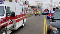 Canton, OH, police investigate a crash involving an ambulance (left) and Kia Forte that injured five Wednesday. Canton, OH, police investigate a crash involving an ambulance (left) and Kia Forte that injured five Wednesday.