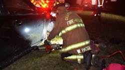 Colleton County, NC, firefighters rescue a trapped woman who used her feet to call 9-1-1 after her hands were crushed while changing a flat tire late Sunday. Colleton County, NC, firefighters rescue a trapped woman who used her feet to call 9-1-1 after her hands were crushed while changing a flat tire late Sunday.