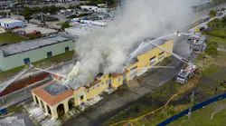 Delray Beach, FL, firefighters work to put out flames after a defunct train station caught fire Tuesday.