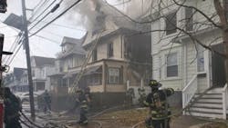 A Newark, NJ, firefighter was injured when a ceiling partially collapsed while battling a two-alarm residential fire Thursday.