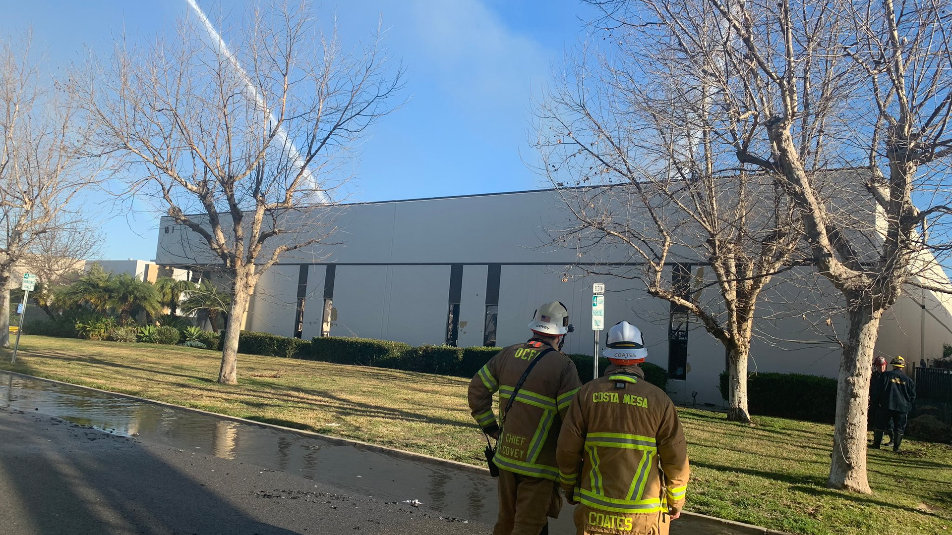 More than 100 Orange County, CA, Fire Authority firefighters battled a massive four-alarm blaze that broke out a nonprofit's warehouse headquarters in Irvine on Sunday.