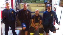 Fayetteville, AR, firefighter Jake Blackburn, left, poses with several of his colleagues in this undated photo.