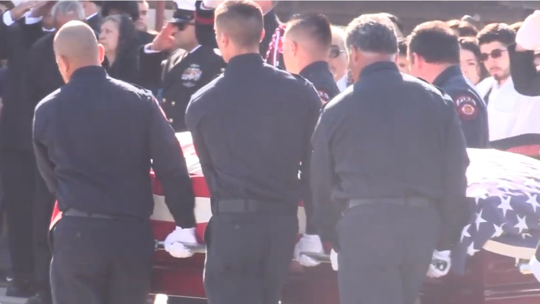 Family, friends and firefighters from around the area attended the funeral of Porterville, CA, Fire Capt. Ramon 'Ray' Figureoa, who died along with firefighter Patrick Jones battling a library blaze last week.