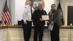 Rochester, NH, firefighter Sam Morrill (center) was named the city’s Employee of the Month for February after recently building cool air gear dryers for his department. Rochester, NH, firefighter Sam Morrill (center) was named the city’s Employee of the Month for February after recently building cool air gear dryers for his department.