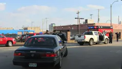 A St. Louis Fire Department ambulance was struck by a pickup truck after the vehicle was hit by gunfire Saturday.