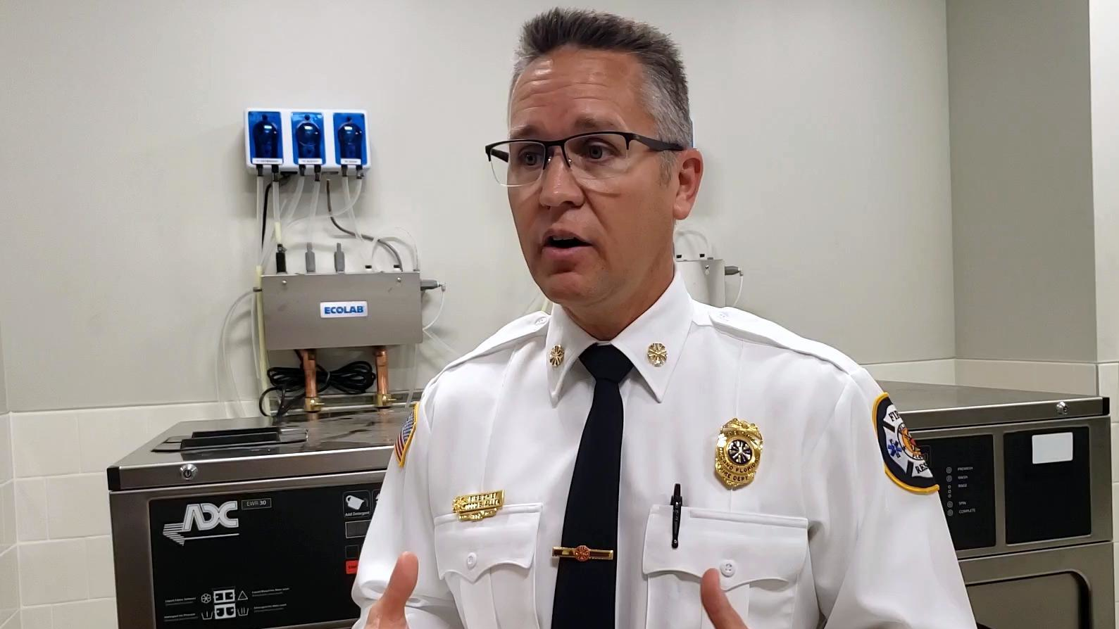 DeLand, FL, Fire Chief Todd Allen speaks about the importance of thoroughly cleaning firefighters' gear during a visit to DaVita Labs in DeLand, which donated two sets of industrial-grade washers and dryers to the Fire Department on Friday, Jan. 31, 2020.