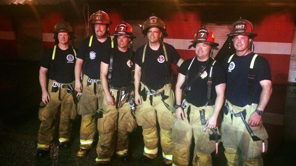 Jacksonville, FL, firefighter Brian Kernohan, second from left, poses for a photo with colleagues in this 2015 photo.