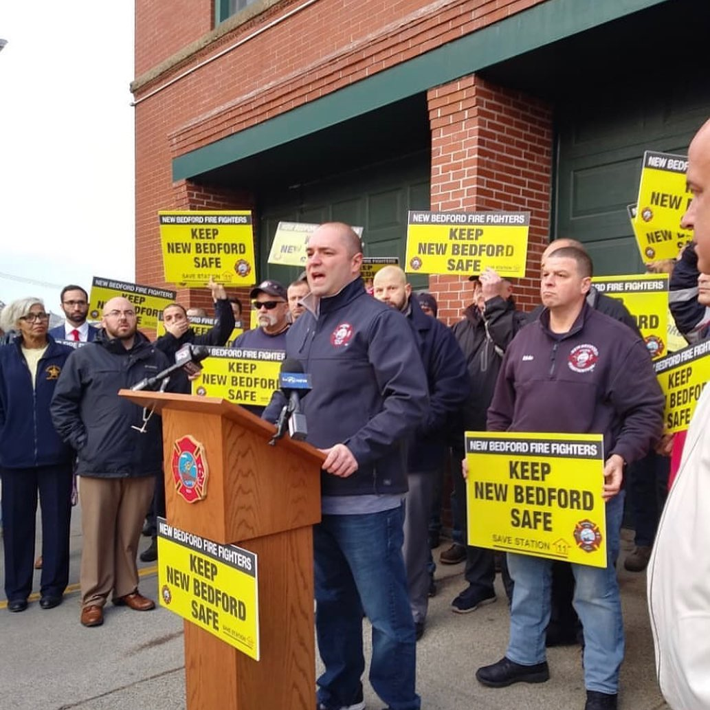 Billy Sylvia, president of New Bedford, MA, Firefighters, Local 841, speaks at a demonstration Wednesday protesting the decommissioning of the fire department's Engine 11 as a way to end a policy of rotating blackouts.