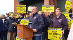 Billy Sylvia, president of New Bedford, MA, Firefighters, Local 841, speaks at a demonstration Wednesday protesting the decommissioning of the fire department's Engine 11 as a way to end a policy of rotating blackouts.