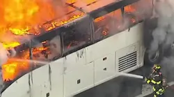 Firefighters battled a large bus fire on Interstate 78 after the vehicle burst into flames in Union Township early Thursday.