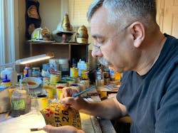 Painting helmet shields isn’t Stella’s job. It’s his passion. In 2019, he painted nearly 1,000 shields. Painting helmet shields isn’t Stella’s job. It’s his passion. In 2019, he painted nearly 1,000 shields.