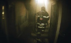 Smiley and his fellow members of Rescue 23 made their way up the interior stairs. As he passed the hoseline, he thought it still was dry, which made him believe that the incident was a smoldering bedroom fire. Smiley and his fellow members of Rescue 23 made their way up the interior stairs. As he passed the hoseline, he thought it still was dry, which made him believe that the incident was a smoldering bedroom fire.