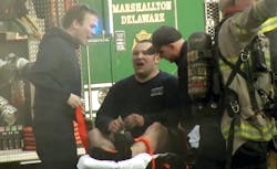 Upon escaping the burning house, Smiley removed his gear and got onto a stretcher. He was loaded into a BLS ambulance and taken to a hospital, where he was intubated. Among the lessons that he says he learned: wear a helmet with a chin strap and fasten the waist strap on his air pack. Upon escaping the burning house, Smiley removed his gear and got onto a stretcher. He was loaded into a BLS ambulance and taken to a hospital, where he was intubated. Among the lessons that he says he learned: wear a helmet with a chin strap and fasten the waist strap on his air pack.