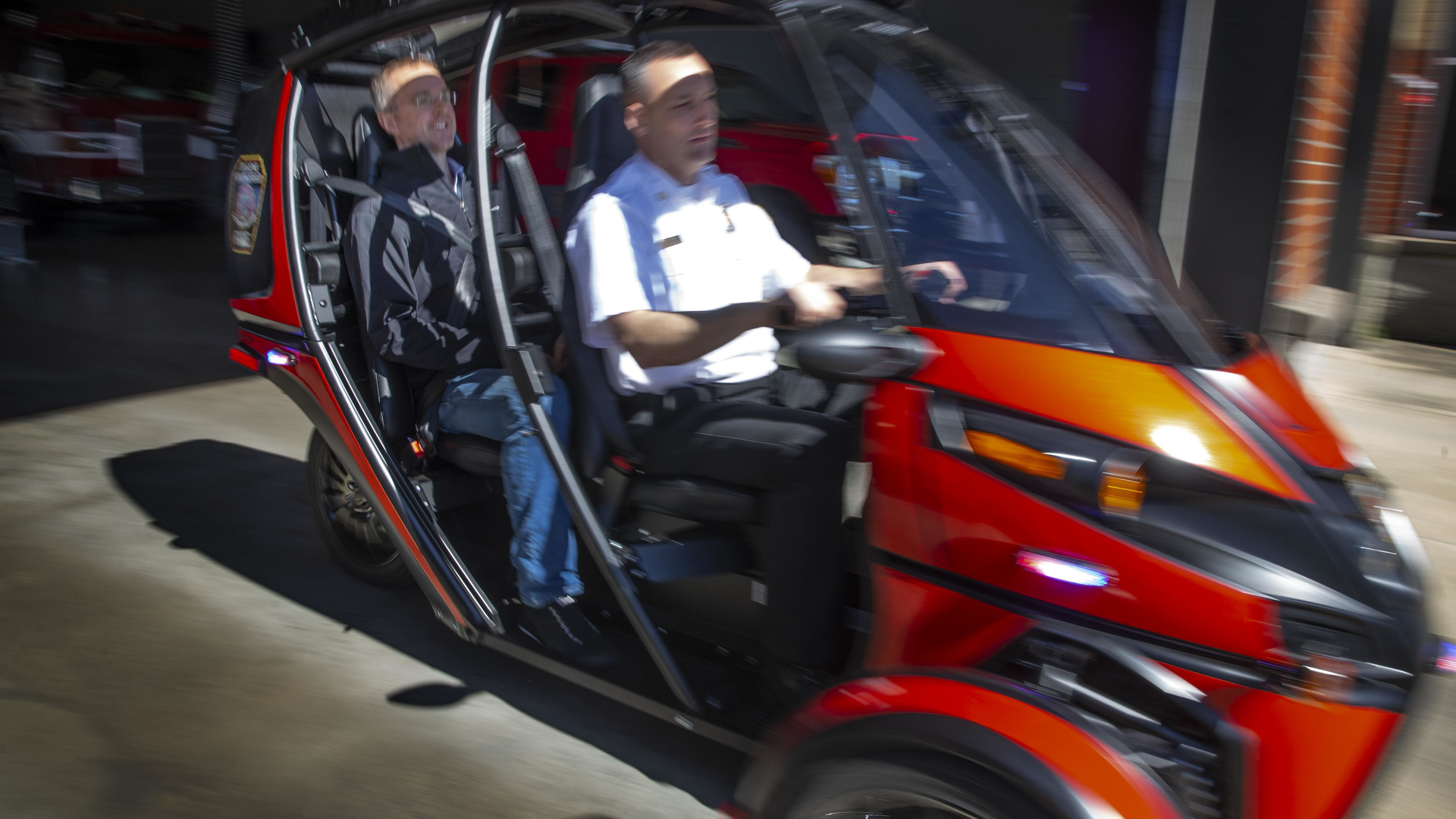 Eugene Springfield , OR,Fire Deputy Chief Markus Lay takes the new Rapid Responder by Arcimoto for a spin, with Arcimoto&rsquo;s Mark Frohnmayer, at Station 2 in Eugene.