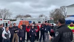 FDNY Commissioner Daniel Nigro (right) greets additional EMTs and paramedics Tuesday at Fort Totten in Queens. FDNY Commissioner Daniel Nigro (right) greets additional EMTs and paramedics Tuesday at Fort Totten in Queens.