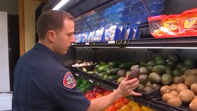 Glendale, CA, firefighter Spencer Hammond is one of the members of the department who is helping residents housebound because of the coronavirus pandemic by buying and delivering groceries to them.