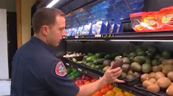 Glendale, CA, firefighter Spencer Hammond is one of the members of the department who is helping residents housebound because of the coronavirus pandemic by buying and delivering groceries to them.