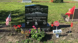 The grave site of Berwick, ME, Fire Capt. Joel Barnes, who died last year battling an apartment fire.