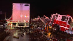 Four Marion, AR, firefighters suffered minor injuries after their apparatus was struck by a tractor-trailer along interstate 55 on Monday.