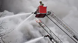 For more than four hours, Minneapolis firefighters battled a four-alarm blaze that spread to multiple buildings Sunday.
