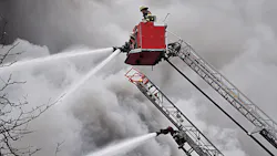 For more than four hours, Minneapolis firefighters battled a four-alarm blaze that spread to multiple buildings Sunday.