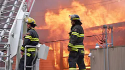 For more than four hours, Minneapolis firefighters battled a four-alarm blaze that spread to multiple buildings Sunday.